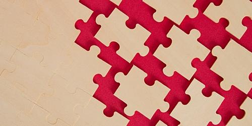 Jigsaw symbolising a merger of two entities